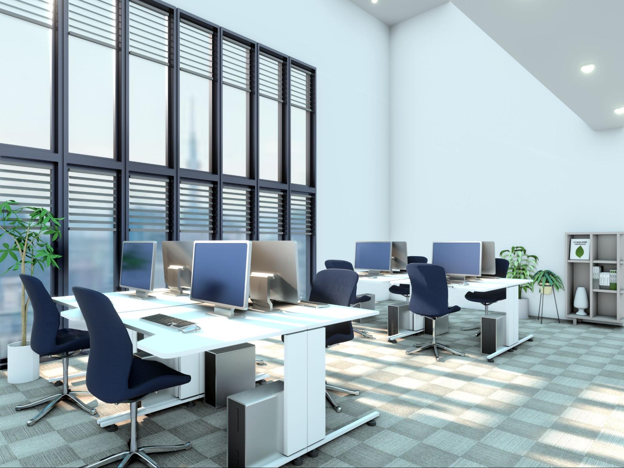 パソコンが配置された現代的で明るいレンタルオフィス